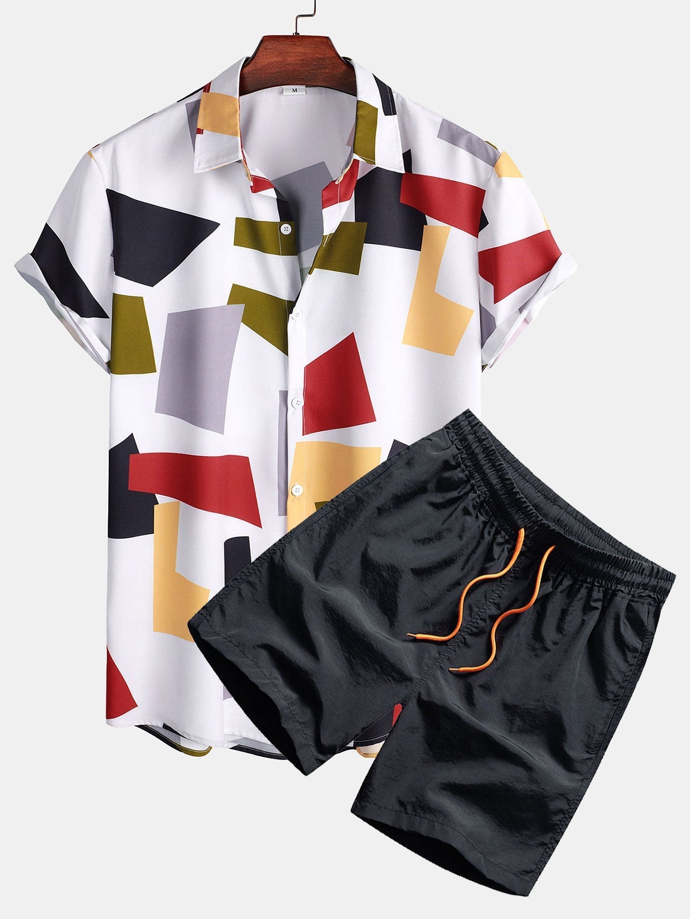 Skjorte og badeshorts med geometrisk fargeblokk og knapptrykk