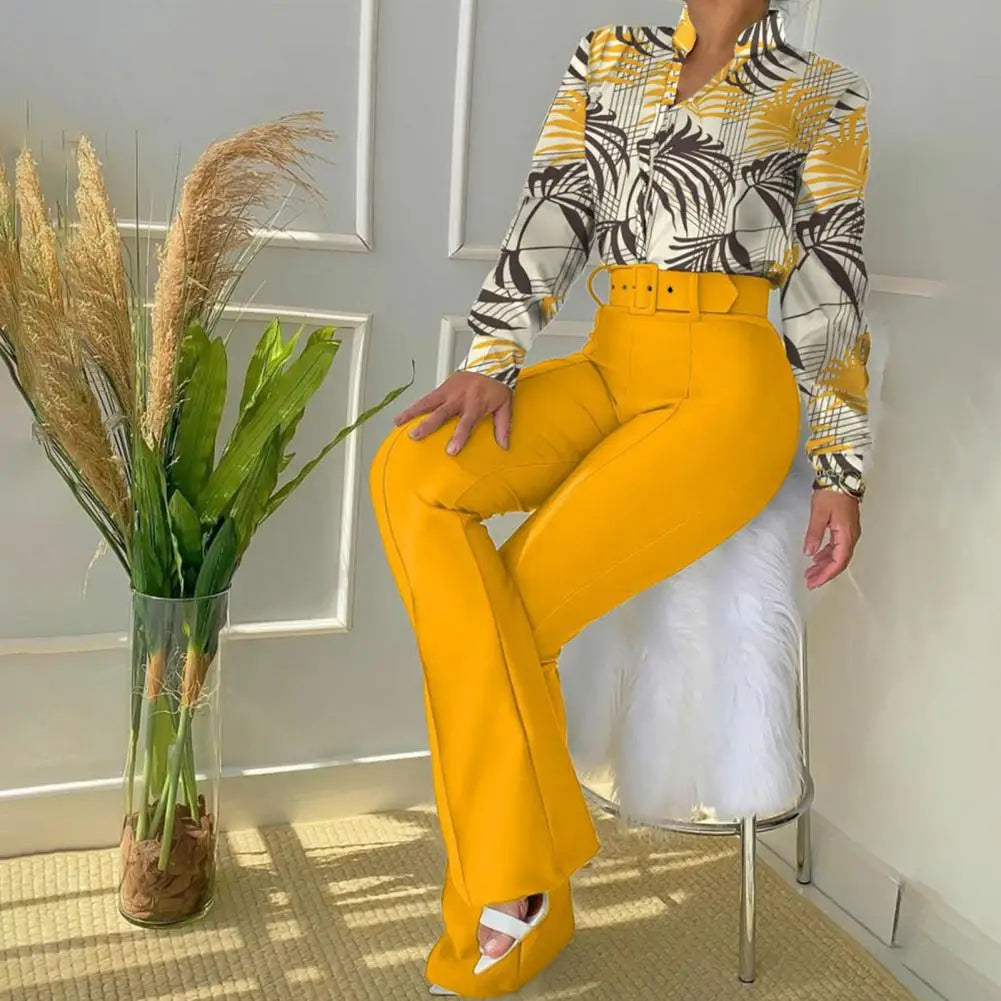 Elegant, mønstret polobluse med lange ermer og buksesett for kvinner