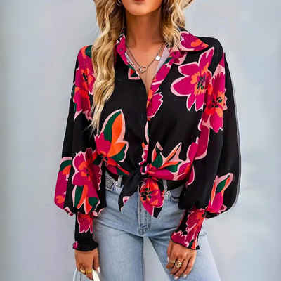 Elegant damebluse med blomster