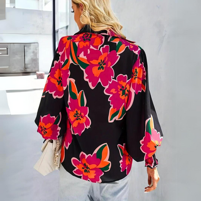 Elegant damebluse med blomster