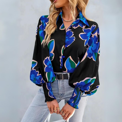 Elegant damebluse med blomster