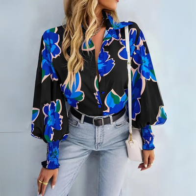 Elegant damebluse med blomster