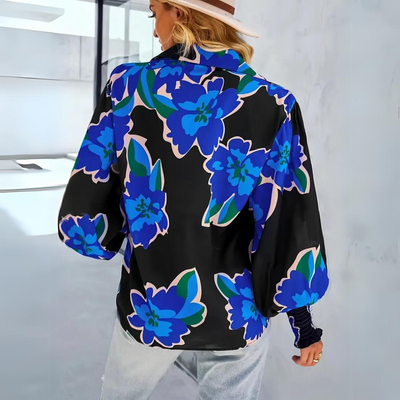 Elegant damebluse med blomster