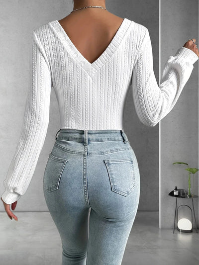 Elastisk slim fit body med lange ermer og elastikk