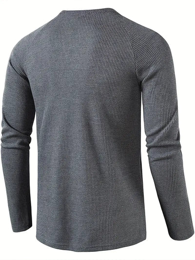 Elegant, ensfarget, langermet poloskjorte for menn