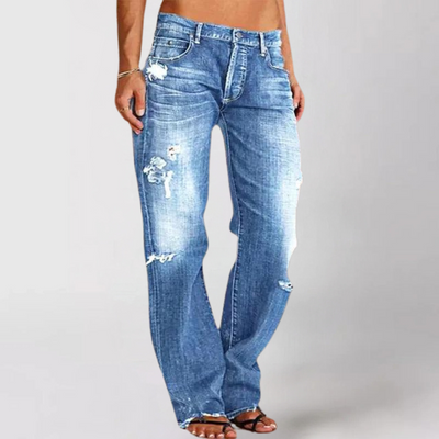 Utsvungne jeans med rifter i denim for kvinner