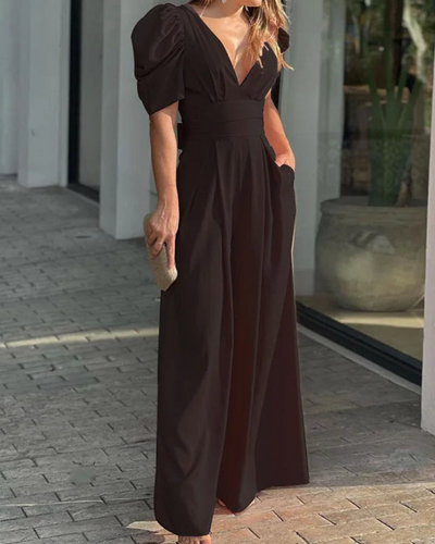 Elegant jumpsuit for kvinner med dyp V-hals, puffermer og vide ben