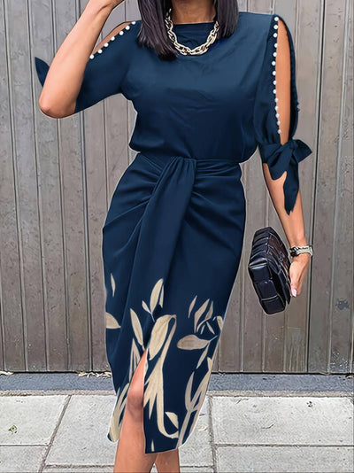 Elegant kjole med perlebesatte ermer