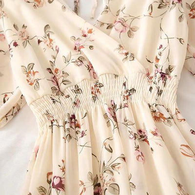 Elegant midikjole med blomstertrykk