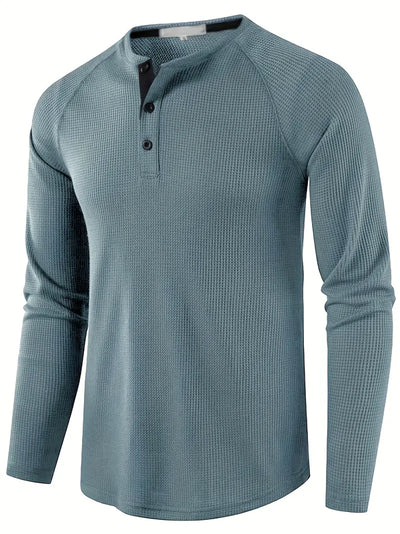 Elegant, ensfarget, langermet poloskjorte for menn