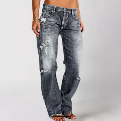 Utsvungne jeans med rifter i denim for kvinner