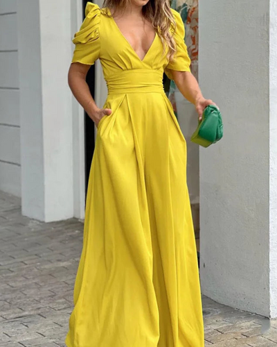 Elegant jumpsuit for kvinner med dyp V-hals, puffermer og vide ben