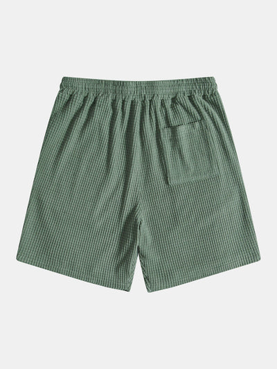 Vaffelknappet skjorte og shorts