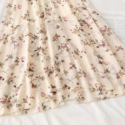 Elegant midikjole med blomstertrykk