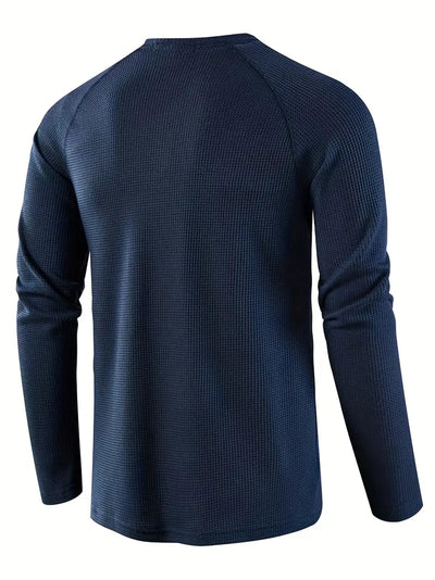 Elegant, ensfarget, langermet poloskjorte for menn
