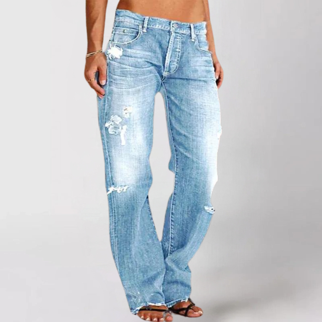 Utsvungne jeans med rifter i denim for kvinner
