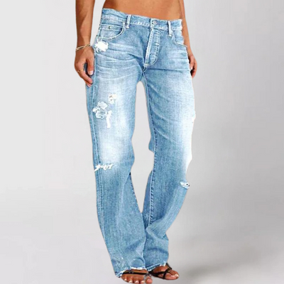 Utsvungne jeans med rifter i denim for kvinner