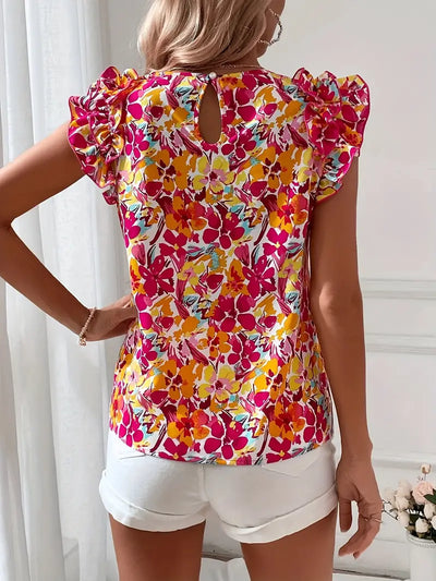 Elegant bluse med rund hals, blomstertrykk og volanger