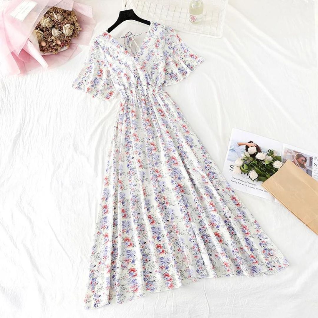 Elegant midikjole med blomstertrykk
