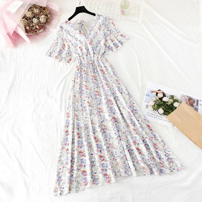 Elegant midikjole med blomstertrykk