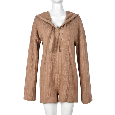 Strukturert jumpsuit med hette og lommer foran
