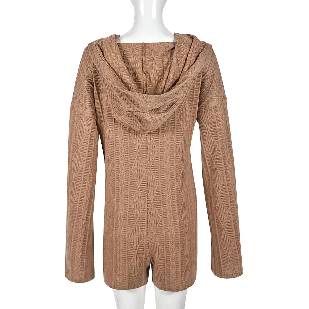 Strukturert jumpsuit med hette og lommer foran