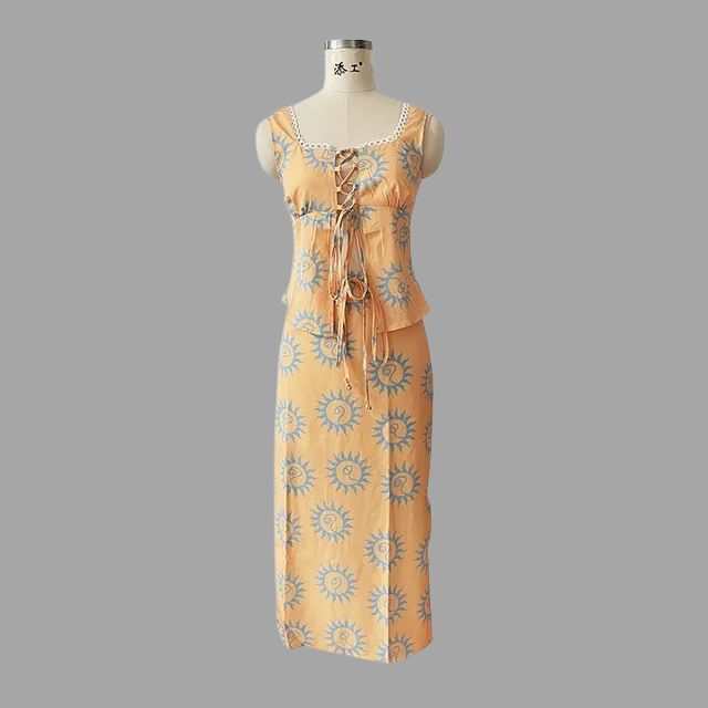 Boho chic maxikjole og topp med solstråleprint
