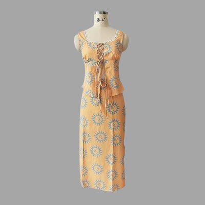 Boho chic maxikjole og topp med solstråleprint