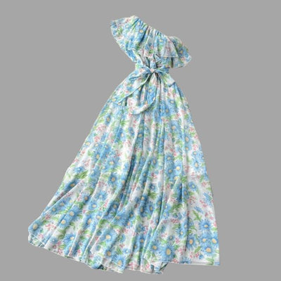 Blomstret kjole med halterneck og volanger