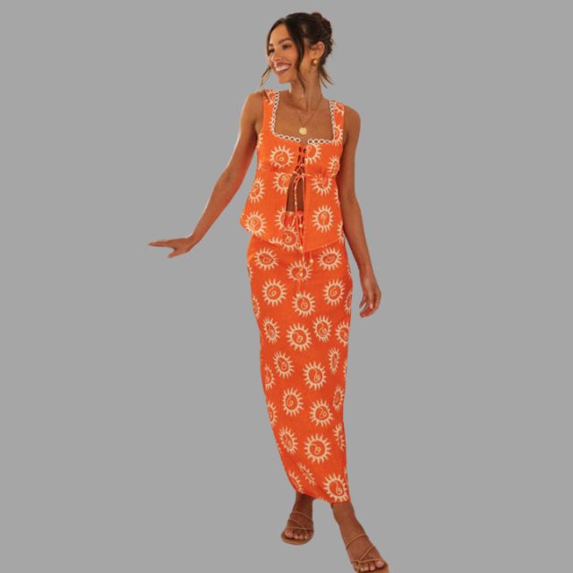 Boho chic maxikjole og topp med solstråleprint