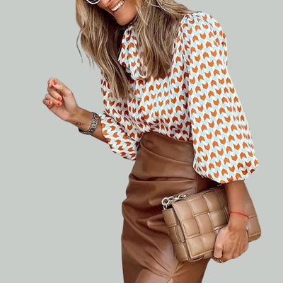 Bluse med houndstooth-trykk og høy krage