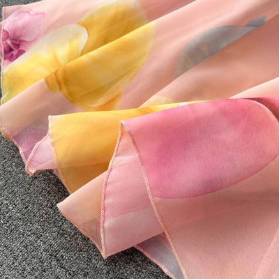Blomstret kjole med halterneck og volanger