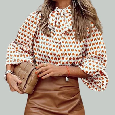 Bluse med houndstooth-trykk og høy krage