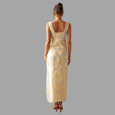 Boho chic maxikjole og topp med solstråleprint