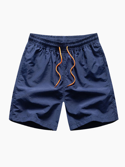 Skjorte med knappelukking og badeshorts med palmemønster