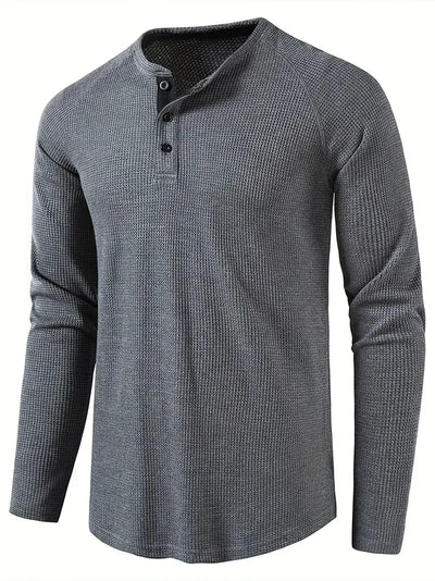 Elegant, ensfarget, langermet poloskjorte for menn