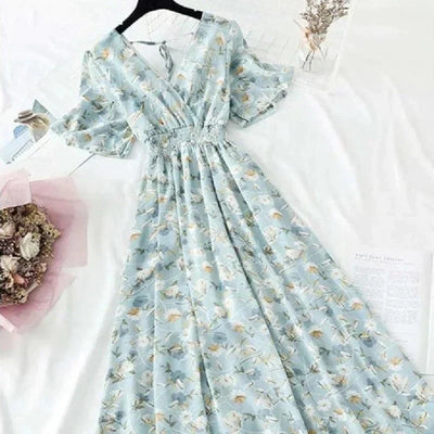 Elegant midikjole med blomstertrykk