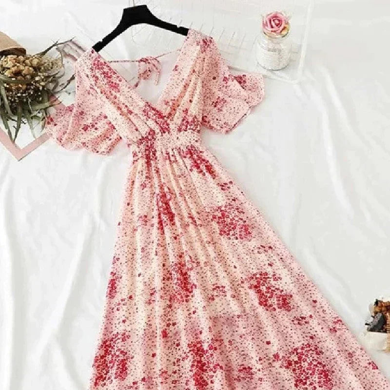 Elegant midikjole med blomstertrykk