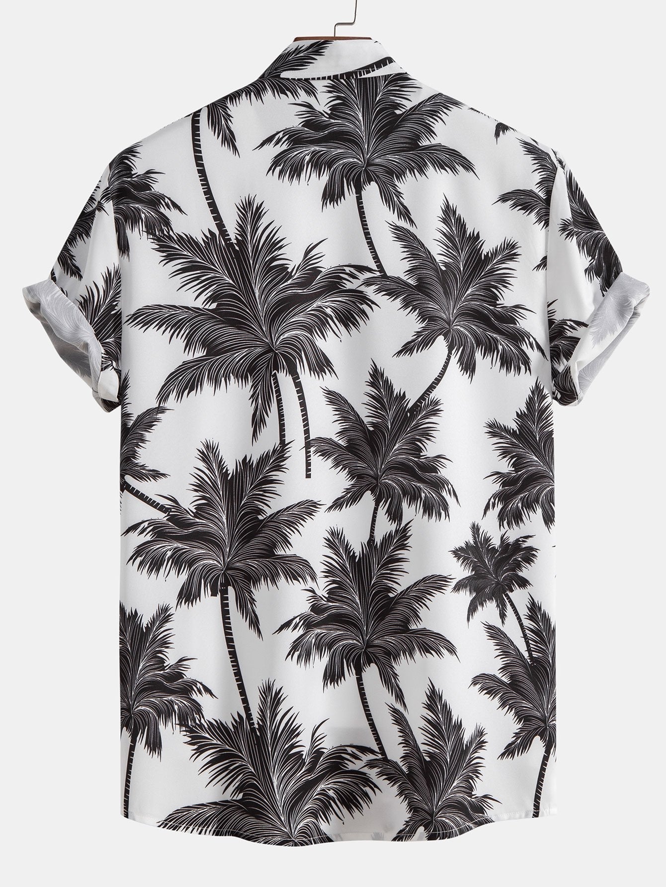 Skjorte med knapp og badeshorts med palmetreprint